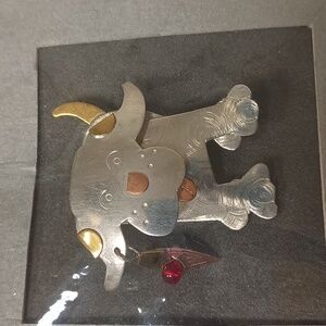 Metal Dog pin with moving parts